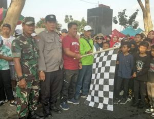 Ribuan Warga Kelurahan Tosaren Berbaur, Tumplek-Blek  Ramaikan Jalan Santai Penutup Rangkaian Peringatan HUT RI -78