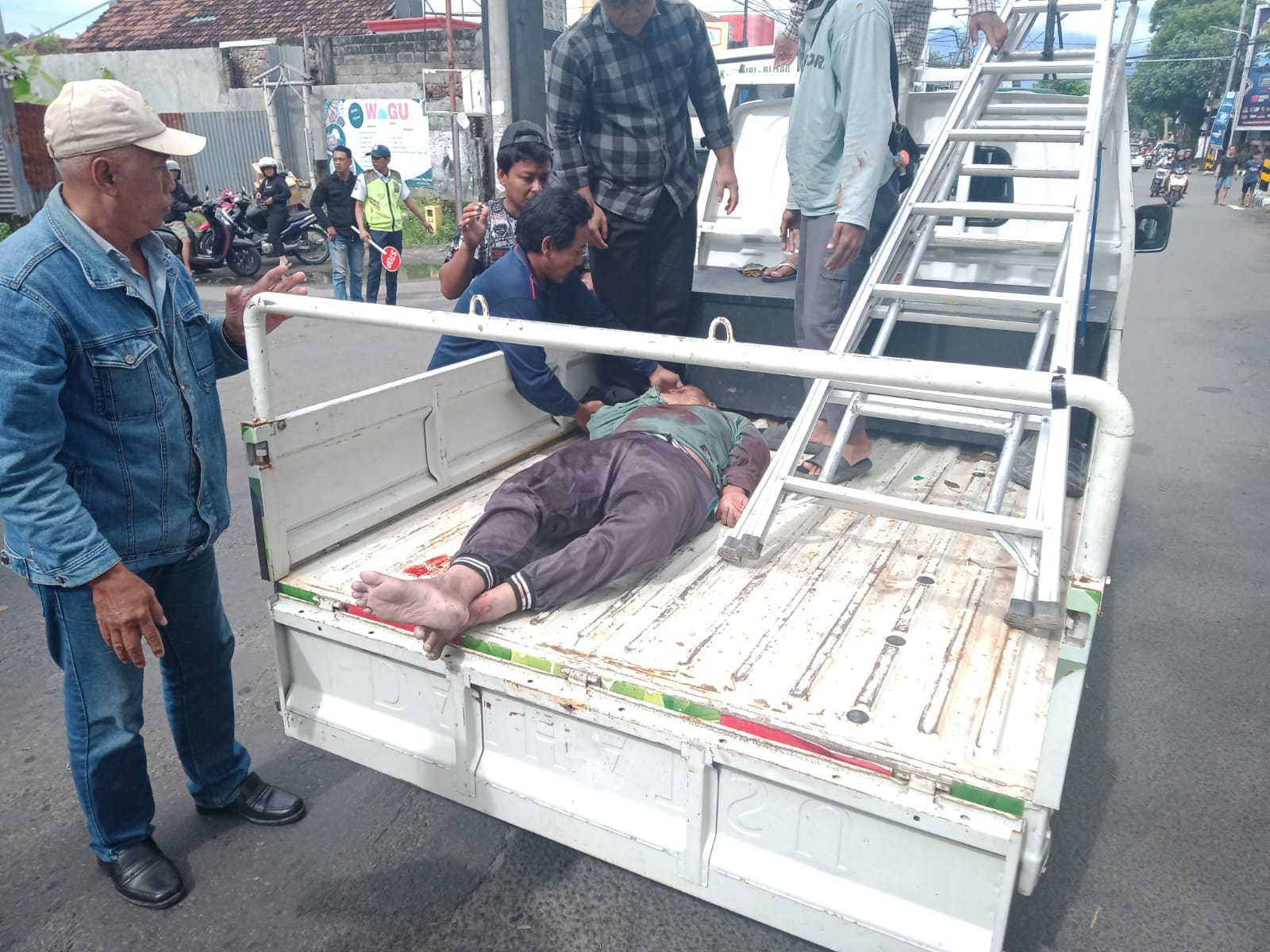 Pedagang Asongan Tewas Tertabrak Bus Harapan Jaya di Simpang Empat Baruna