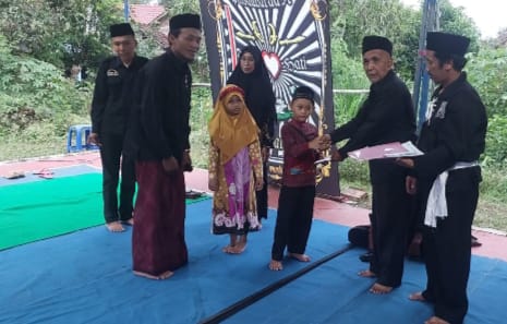 PSHT Rayon Lebak Tumpang Santuni Anak Yatim dan Gelar Buka Puasa Bersama