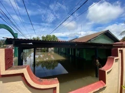 Foto : Banjir yang melanda Kabupaten Bone Bolango, Gorontalo pada Jumat (11/4). (BPBD Kabupaten Bone Bolango)