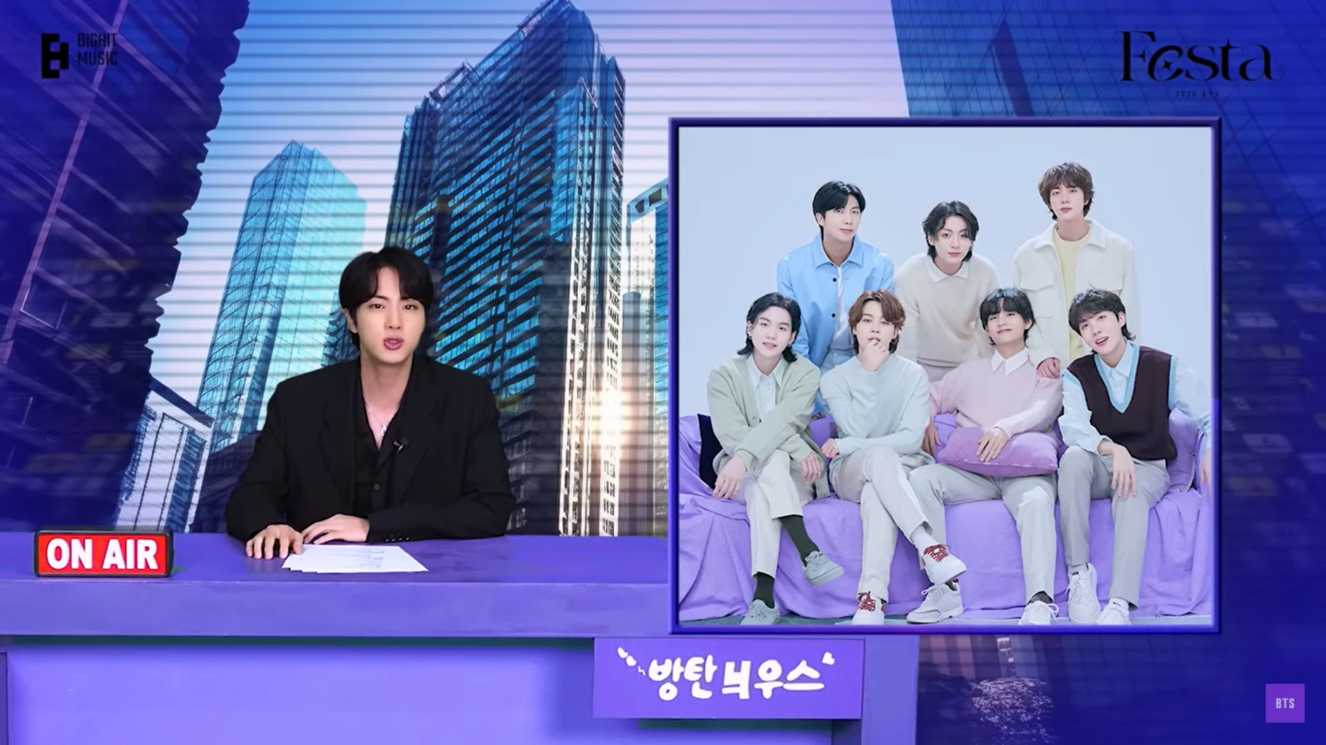Resmi Kembali! Jin BTS Jadi News Anchor Kocak di FESTA 2025