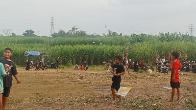 Hari Minggu, Anak-Anak Padati Sawah di Kelurahan Tosaren untuk Main Layangan, Hindari Kecanduan Gadged