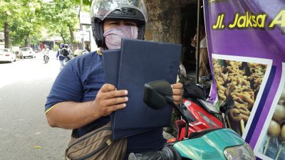 Kesibukan Kerja Jadi Alasan, Wali Murid di Ponorogo Gunakan Jasa Online untuk Ambil Rapor