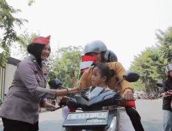 Semarak HUT ke-81 RI, Polres Lamongan Bagikan 2.000 Bendera Merah Putih kepada Warga dan Pengguna Jalan
